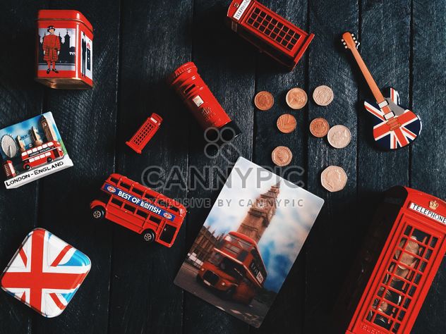 Toys symbols of England on dark wooden background - image #136285 gratis