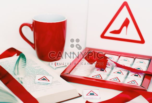 Candies, book and cup of tea - image gratuit #182705 