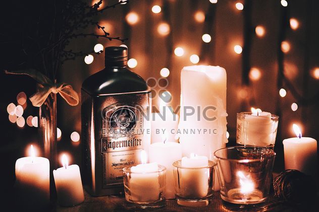Candles and bottle of alcohol - image gratuit #183745 