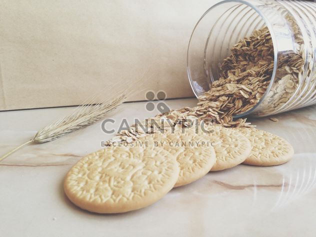 cookies and glass bank with oatmeal - image gratuit #198715 