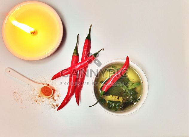 Cup of tea, chili and candle - Kostenloses image #198945