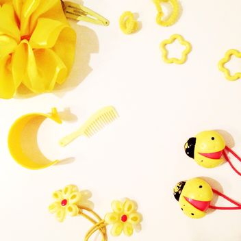 Yellow accessories over white background - Kostenloses image #301345