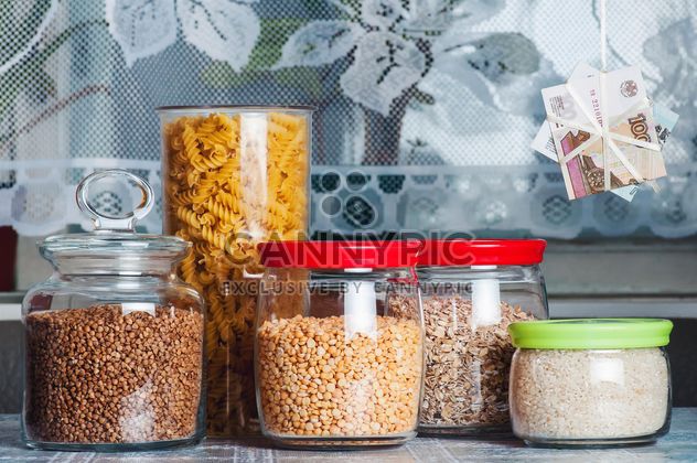 Jars with rice, peas, buckwheat, oatmeal, pasta in the kitchen - Free image #327325