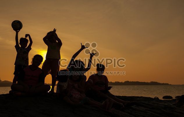 Children on a sea at subset - Free image #344085