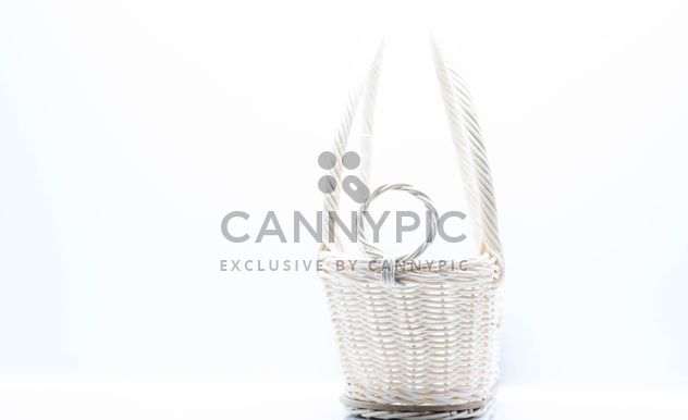 White wicker basket on white background - Kostenloses image #347235