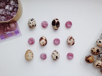 Candies and quail eggs on white background - image gratuit #348665 