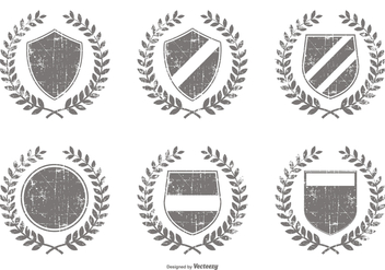 Distressed Vector Crest Shapes - Free vector #397215