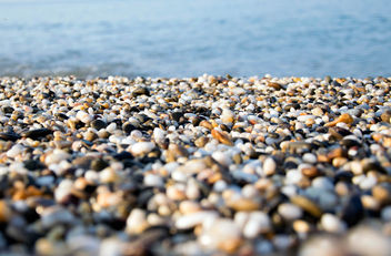 A beach of colourful pebbles at the shore of Black Sea, in Evpatoriya, Crimea - бесплатный image #448055