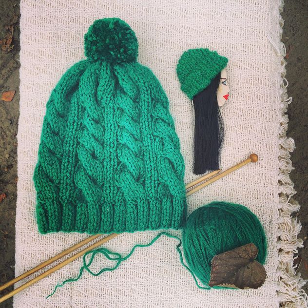 Knitted hat, yarn and knitting needles - image #136685 gratis