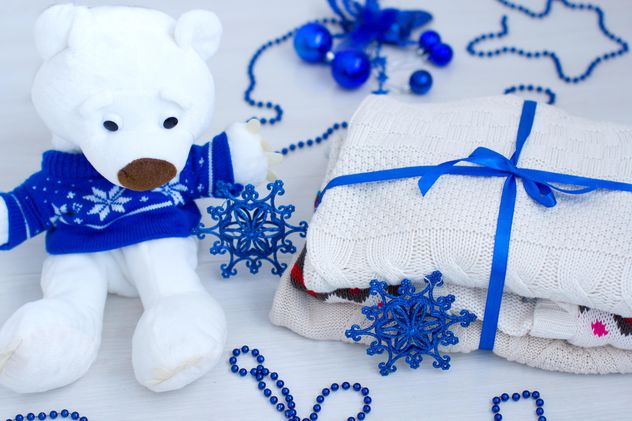 Teddy bear, warm clothing and Christmas decorations - image gratuit #182555 
