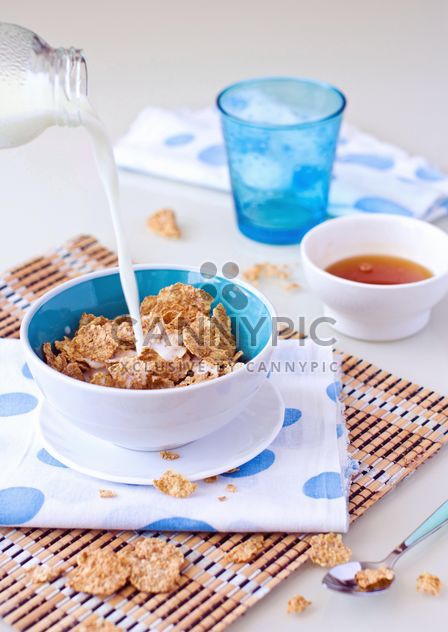 Cereals and milk for breakfast - Free image #182715