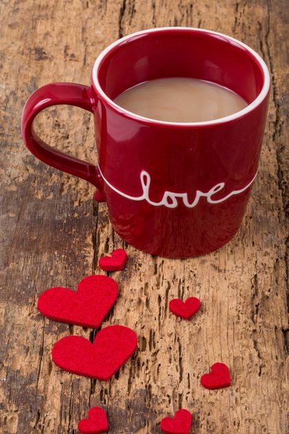 Red cup of coffee and hearts - бесплатный image #182915