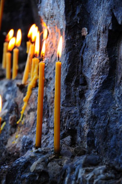 Burning candles on rock - Free image #183055