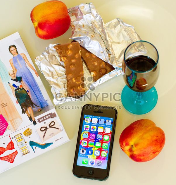 Chocolate, peaches, glass of drink and smartphone - Free image #186005