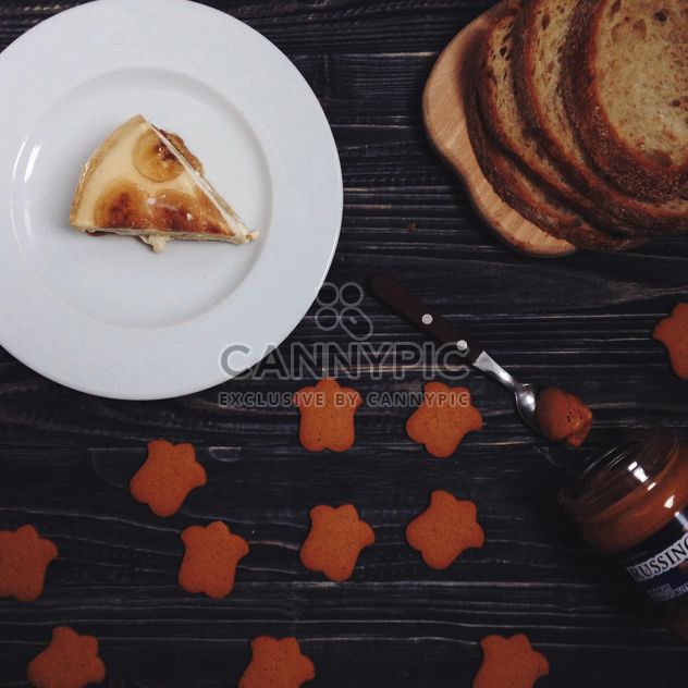 Piece of cheesecake in plate - image #198525 gratis