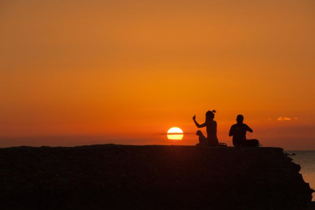 Silhouettes at sunset - Free image #271785