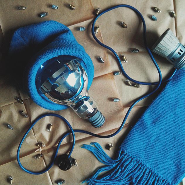 Light bulb in blue hat, scarf and tiny bulbs - image gratuit #272235 