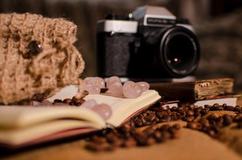 Old camera, books, runes and coffee beans - image #275325 gratis