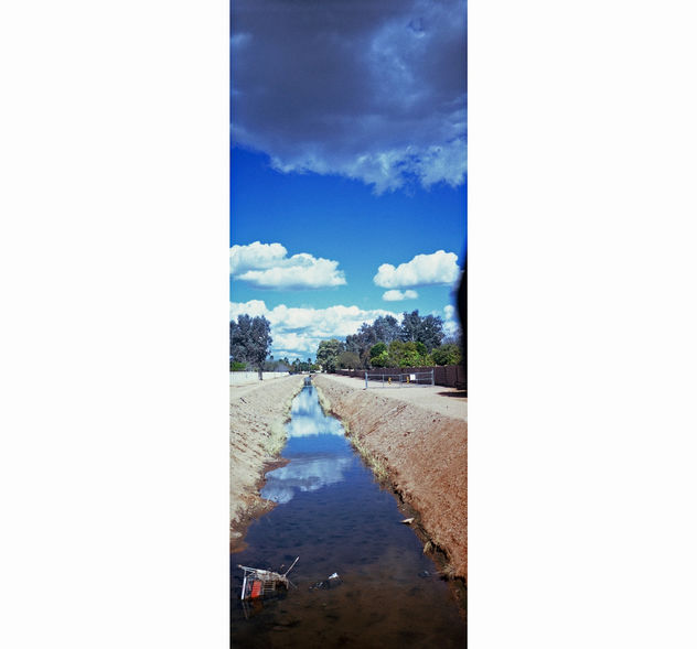 Clouds, canal, and trash bookmark - Kostenloses image #279535