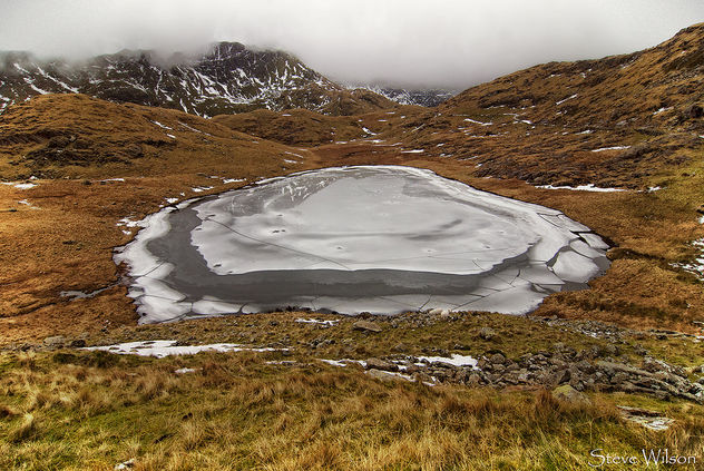 Frozen lake in Snowdonia - Free image #298525