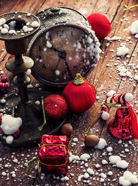 Christmas decorations, vintage clock and candlestick - image #302015 gratis