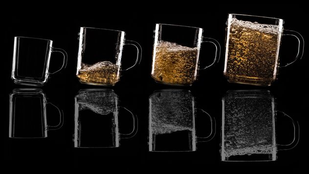 Glass cups on black background - image #303225 gratis