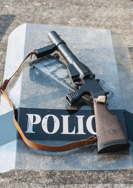 Police shield and rifle - Free image #304605