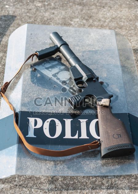 Police shield and rifle - Free image #304605
