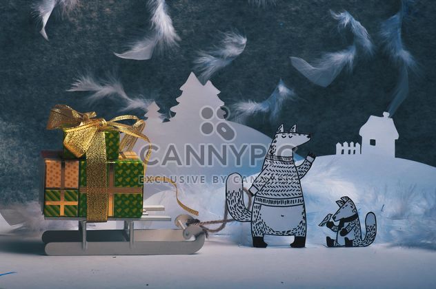 Paper foxes with gifts on sledge in winter - image gratuit #327305 