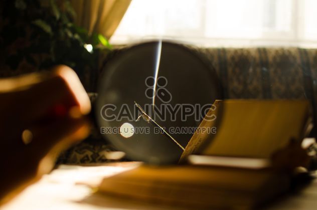 Autumn yellow leaves through a magnifying glass and incense sticks and book - Free image #330415