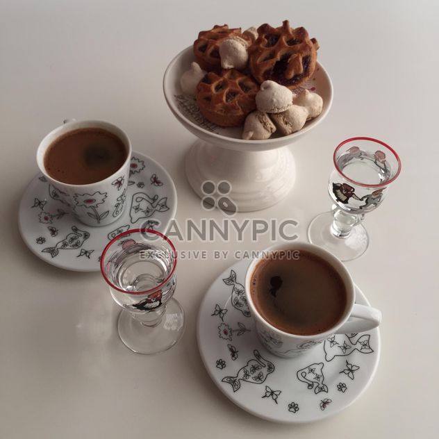 coffee in two cups with coockies - image #330655 gratis