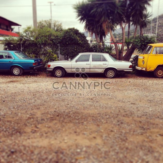 Old cars parked in yard - image #332035 gratis