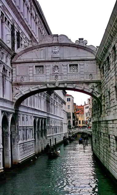 Gondolas on canal in Venice - image #333625 gratis