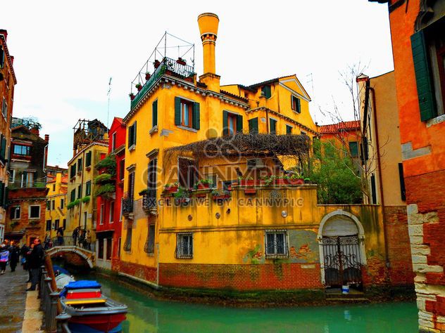 Gondolas on canal in Venice - image #333685 gratis