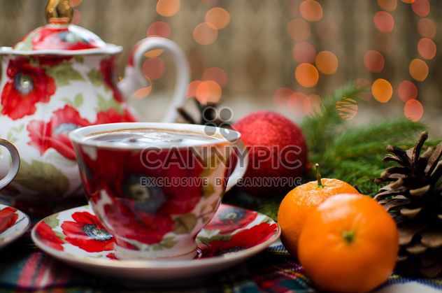 Christmas Eve, warm coffee, mandarin and Christmas toy - бесплатный image #343595