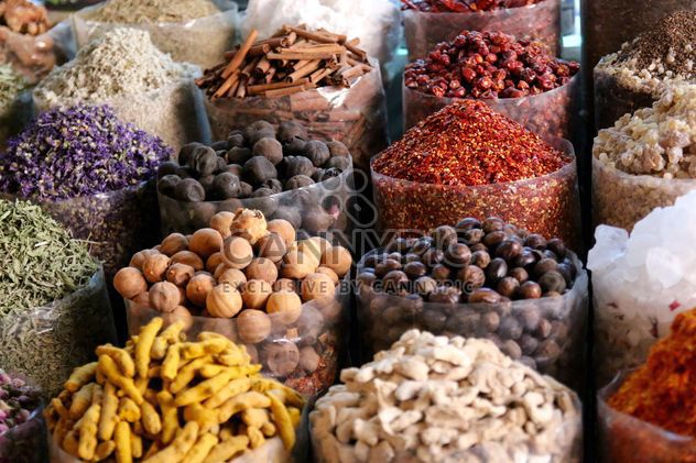 Colorful spices in packages at market - image #344555 gratis