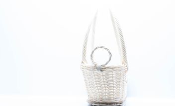 White wicker basket on white background - бесплатный image #347235