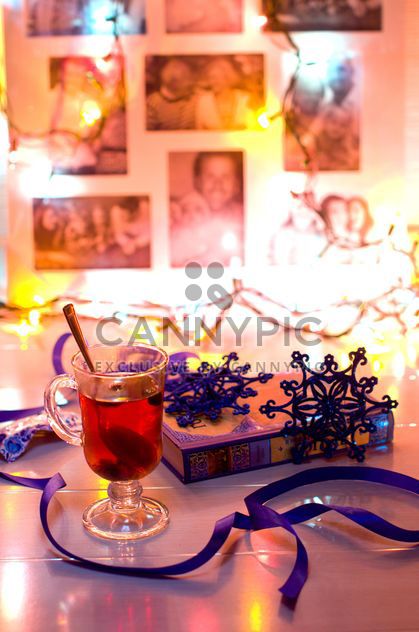 Cup of tea, book and Christmas decorations - Free image #347975