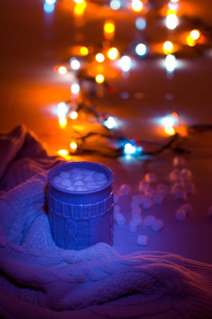 Hot cocoa with marshmallows in light of garlands - Free image #347985