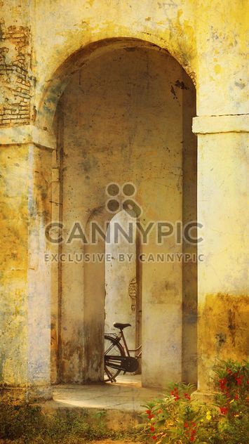 Bicycle in arch of building - Free image #359155
